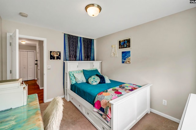 bedroom with light colored carpet