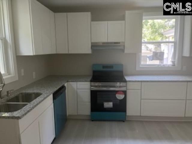 kitchen with light stone counters, white cabinets, dishwasher, light hardwood / wood-style floors, and stainless steel electric range oven