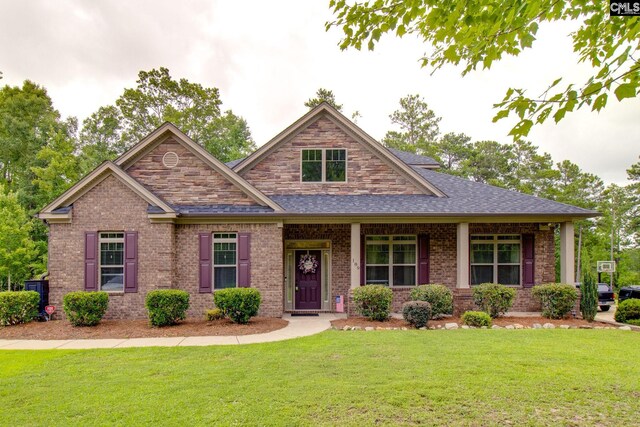 kitchen with crown molding, light hardwood / wood-style flooring, light stone counters, stainless steel appliances, and sink