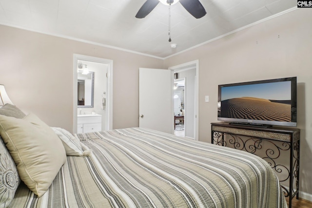 bedroom featuring ensuite bathroom, ornamental molding, and a ceiling fan