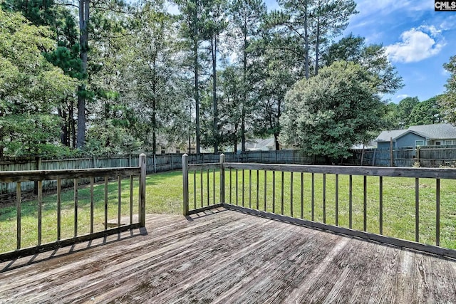 deck featuring a yard