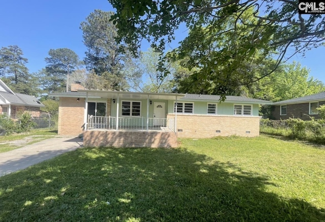 single story home featuring a front yard and covered porch