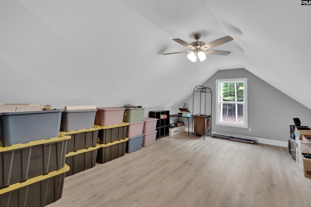 bonus room featuring ceiling fan, light wood-type flooring, and lofted ceiling