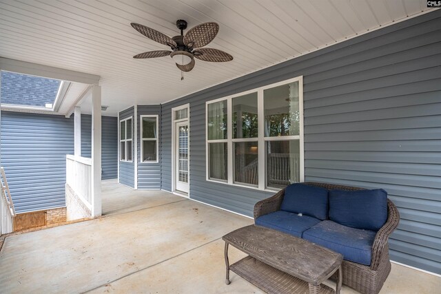 view of patio featuring ceiling fan