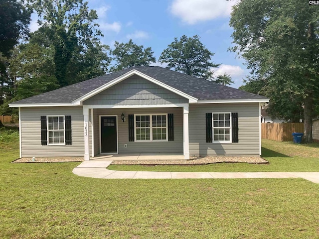 view of front of home with a front yard