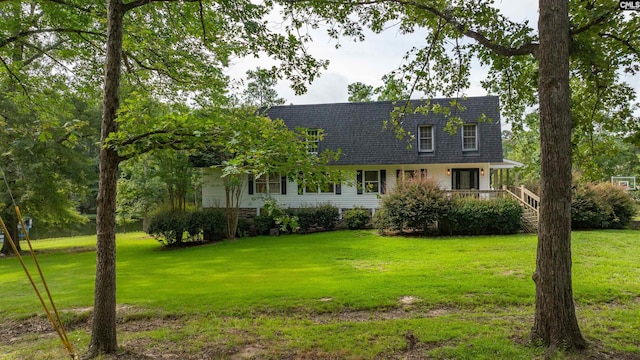 view of front of house with a front lawn