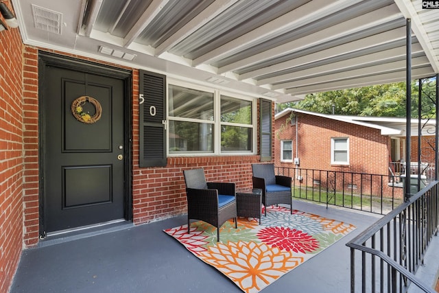 doorway to property featuring a porch