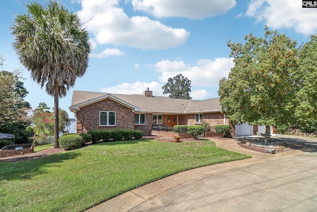 ranch-style home featuring a garage, concrete driveway, brick siding, and a front yard