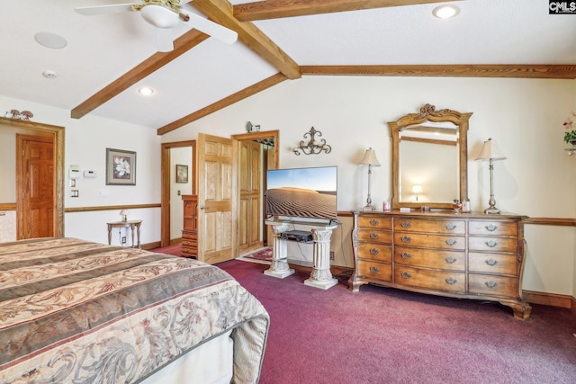 bedroom featuring lofted ceiling with beams, dark colored carpet, and baseboards