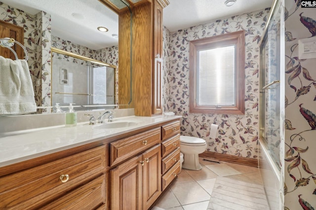 full bath with tile patterned flooring, vanity, toilet, and wallpapered walls