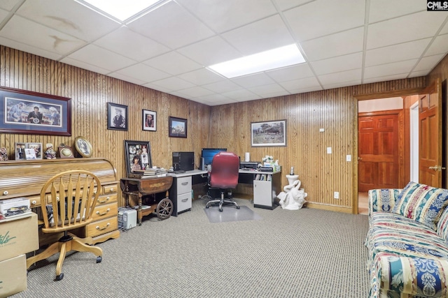 carpeted office featuring a drop ceiling