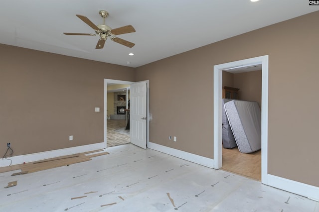 unfurnished bedroom with recessed lighting and baseboards