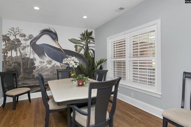 dining area featuring baseboards, recessed lighting, wood finished floors, and visible vents
