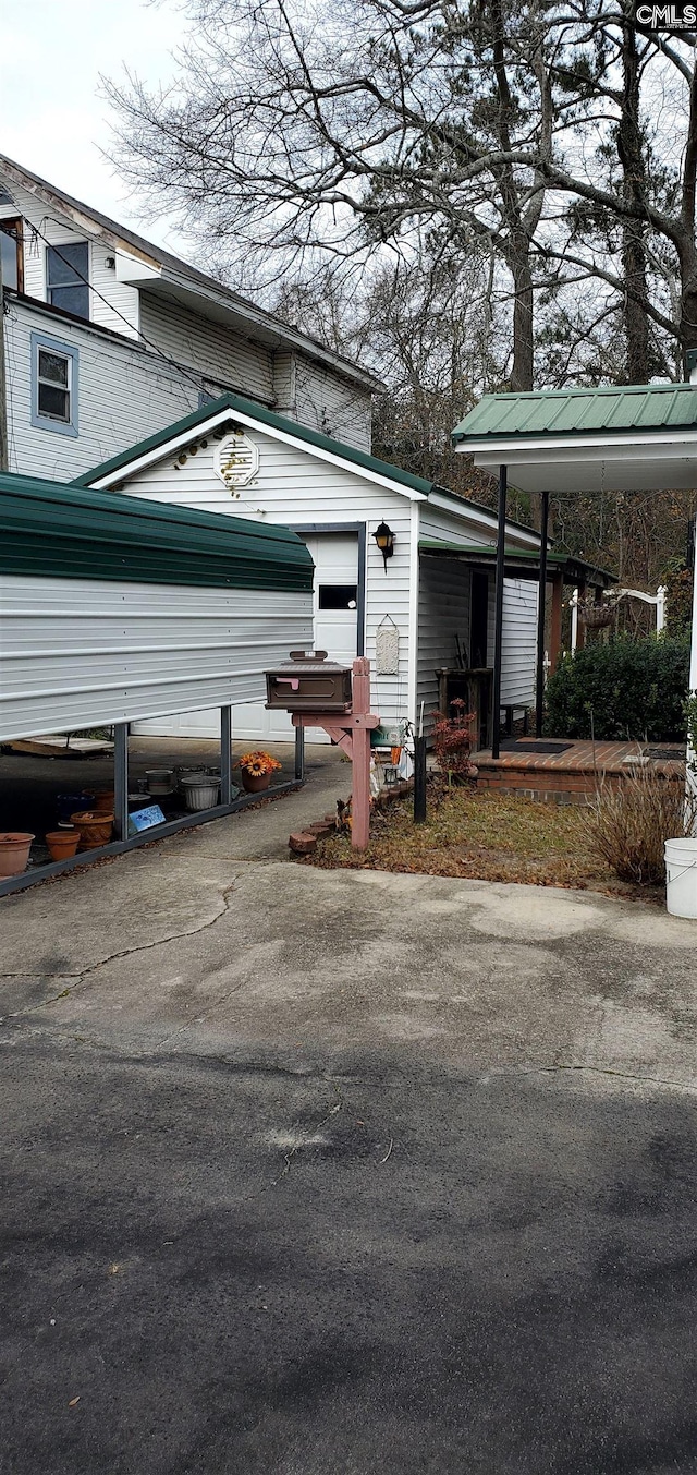 view of side of property featuring a garage