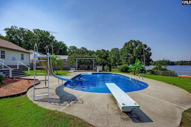 view of swimming pool featuring a patio, a water slide, a water view, a diving board, and a fenced in pool