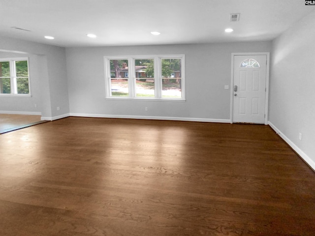 foyer entrance featuring recessed lighting, visible vents, and baseboards