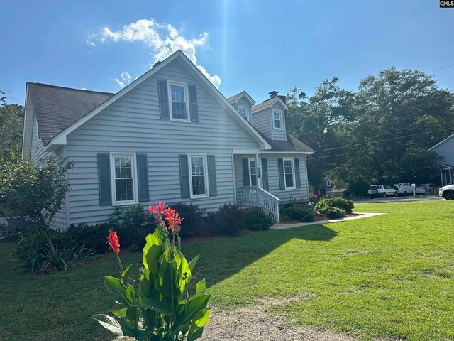 view of front of house with a front yard