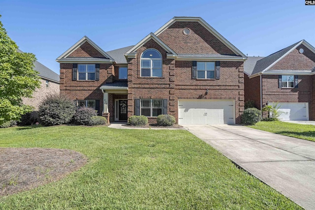 traditional-style home featuring a garage, brick siding, driveway, and a front lawn