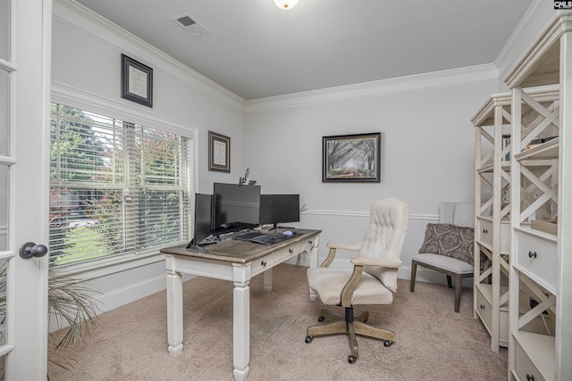 carpeted office with baseboards, visible vents, and ornamental molding