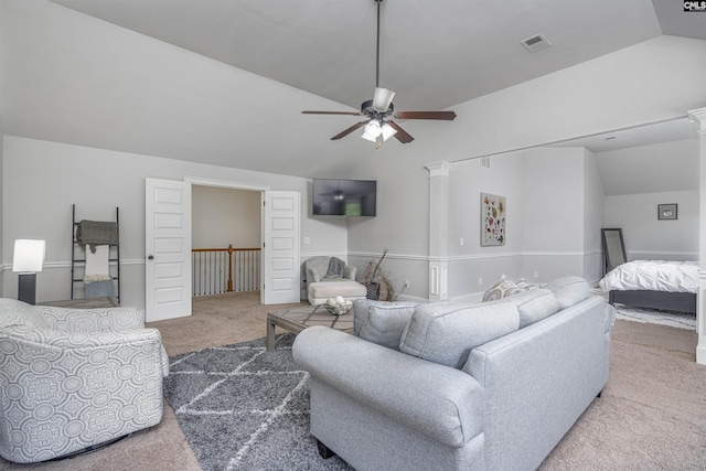 living room with lofted ceiling, carpet, decorative columns, and visible vents