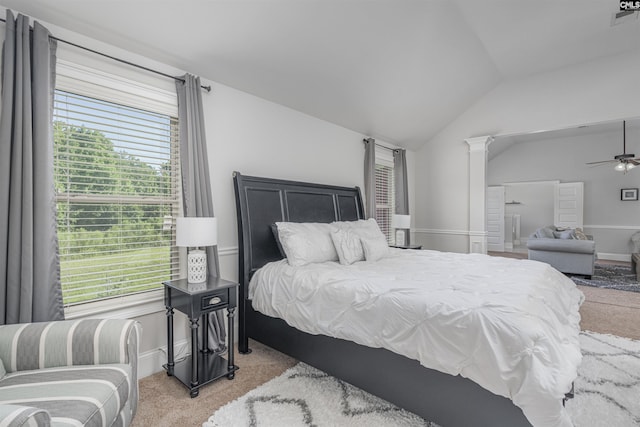 bedroom featuring lofted ceiling, light carpet, and baseboards