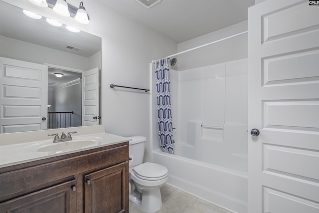 bathroom featuring visible vents, toilet, tile patterned floors, shower / bath combo with shower curtain, and vanity