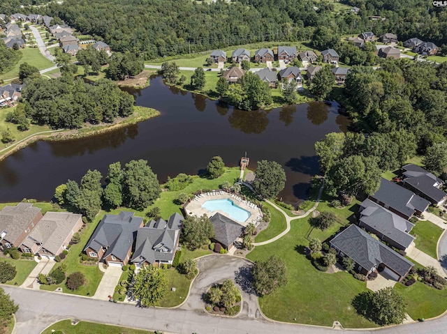 bird's eye view with a water view and a residential view