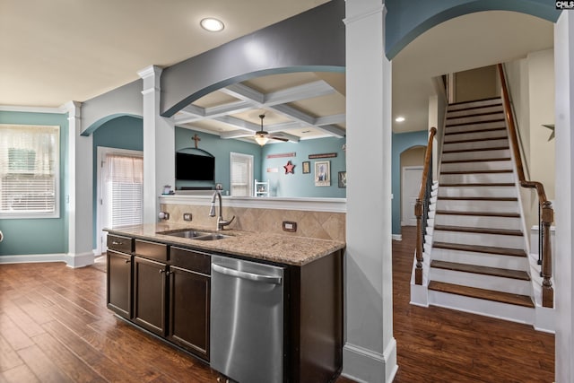 kitchen featuring backsplash, dishwasher, dark hardwood / wood-style floors, coffered ceiling, and sink