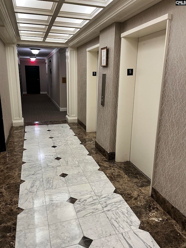 corridor with crown molding, elevator, coffered ceiling, and beam ceiling