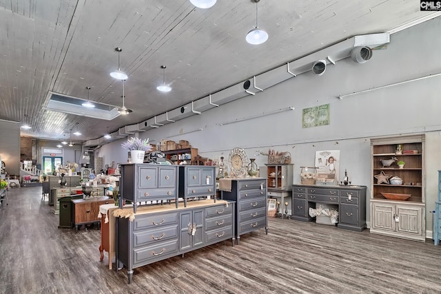 miscellaneous room with dark hardwood / wood-style floors