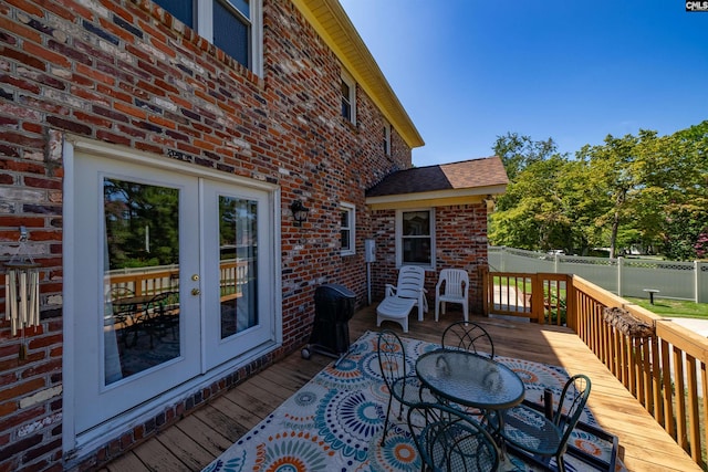 wooden deck with french doors