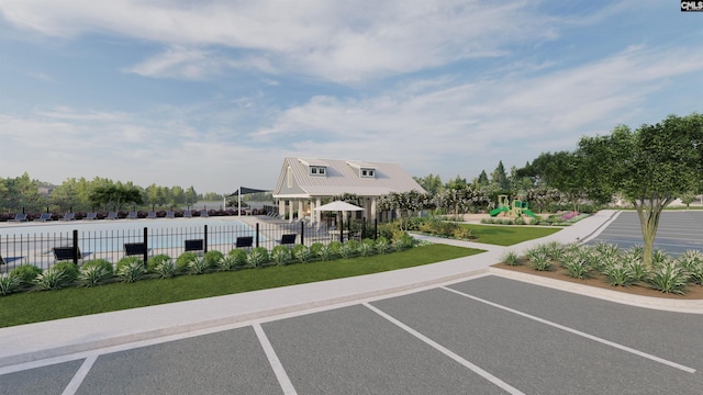 view of parking / parking lot with a playground