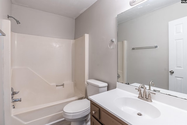 full bathroom with vanity, tub / shower combination, and toilet