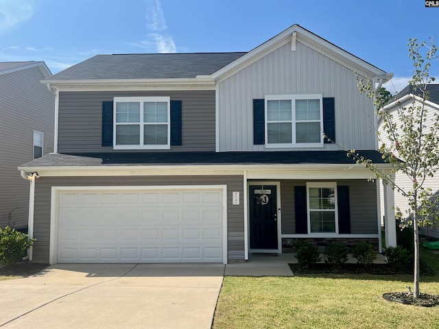 view of front of home featuring a garage, driveway, stone siding, covered porch, and a front yard