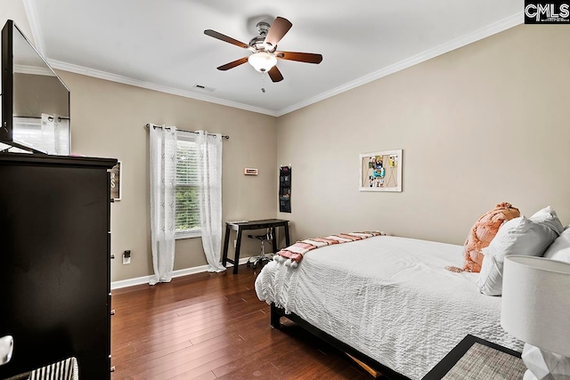 bedroom with ceiling fan, dark wood-type flooring, and ornamental molding