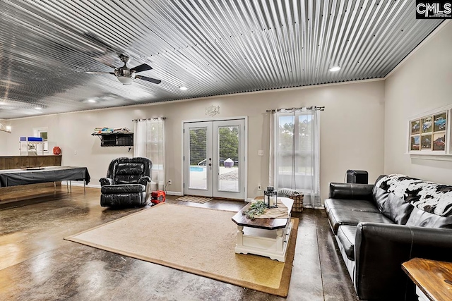 living room with ceiling fan and french doors