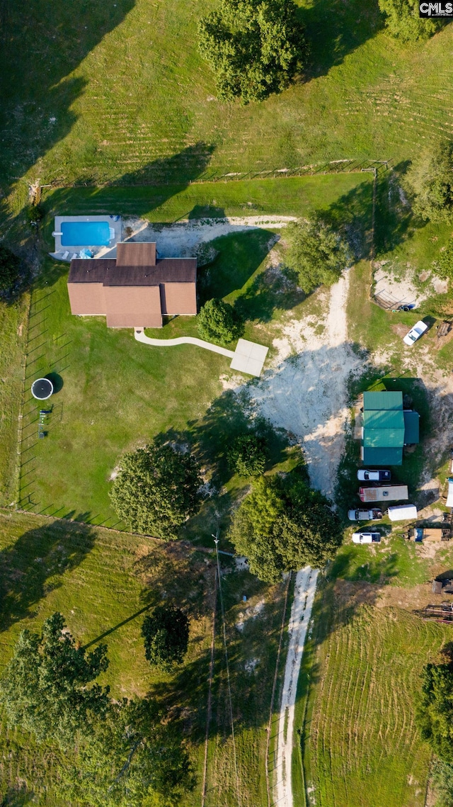 birds eye view of property with a rural view