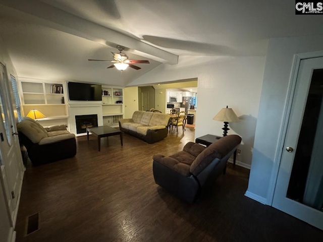 living room featuring ceiling fan, dark wood-type flooring, and lofted ceiling with beams