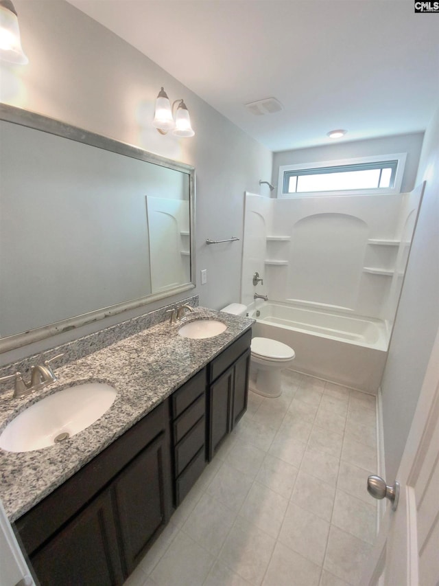 full bathroom featuring tile patterned flooring, vanity, toilet, and shower / bathing tub combination