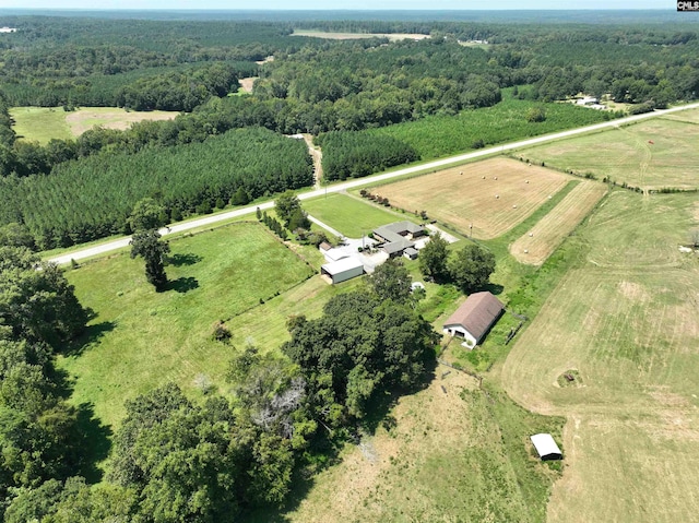 aerial view featuring a rural view and a forest view