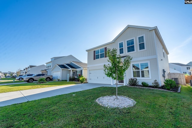 view of front of property with a garage and a front lawn