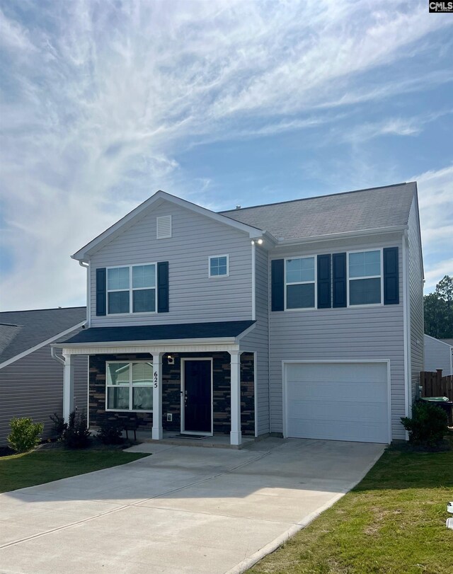 view of front of property with a garage