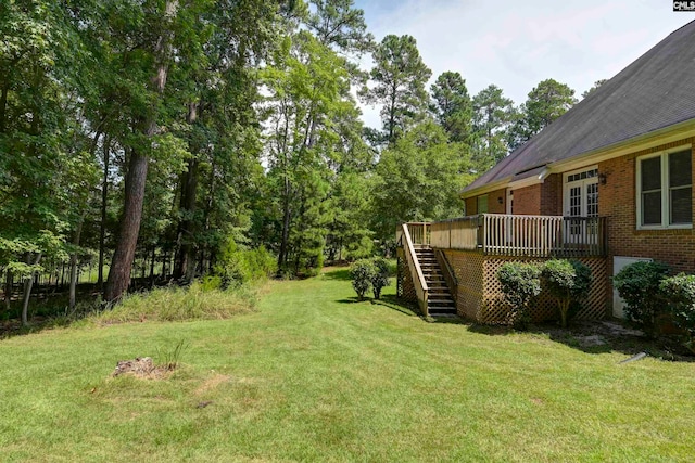 view of yard featuring a wooden deck