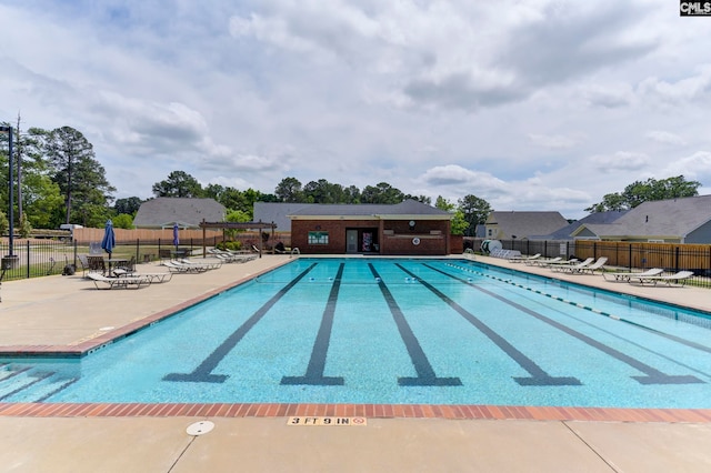 view of pool featuring a patio