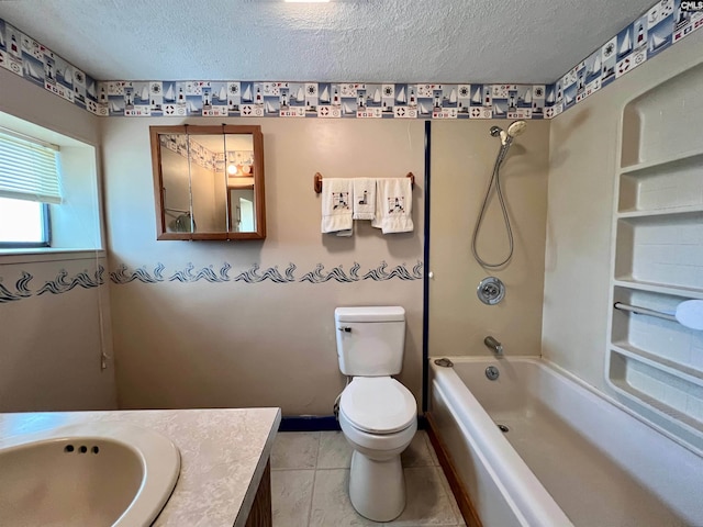 bathroom with bathtub / shower combination, toilet, vanity, a textured ceiling, and tile patterned flooring