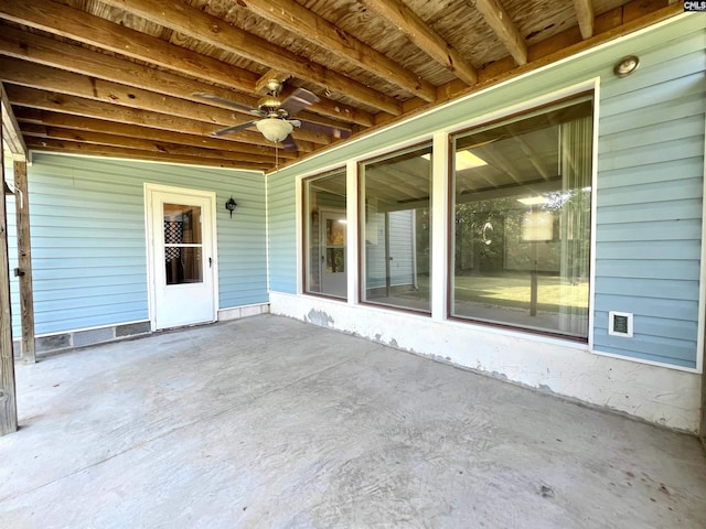 view of patio featuring ceiling fan