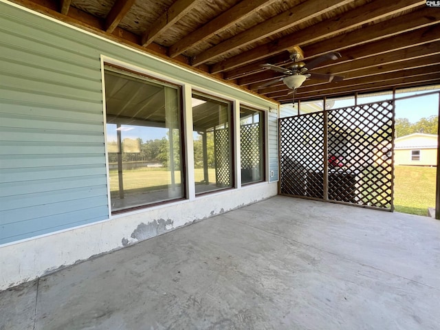 view of patio featuring ceiling fan