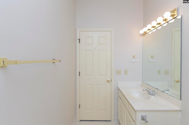 bathroom with vanity and tile patterned floors