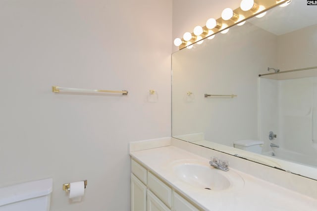 full bathroom with vanity, toilet, and shower / bath combination