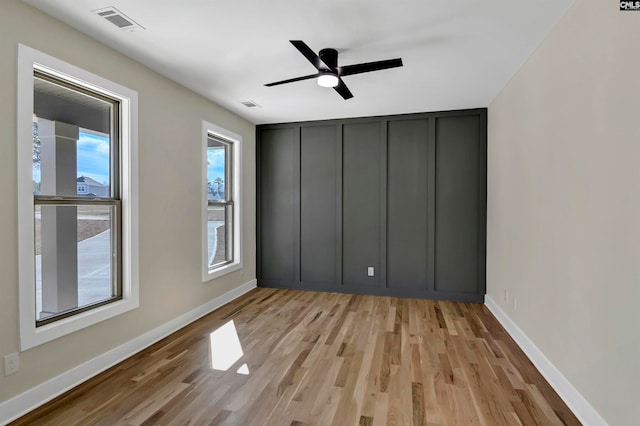 unfurnished bedroom featuring ceiling fan and light wood-type flooring